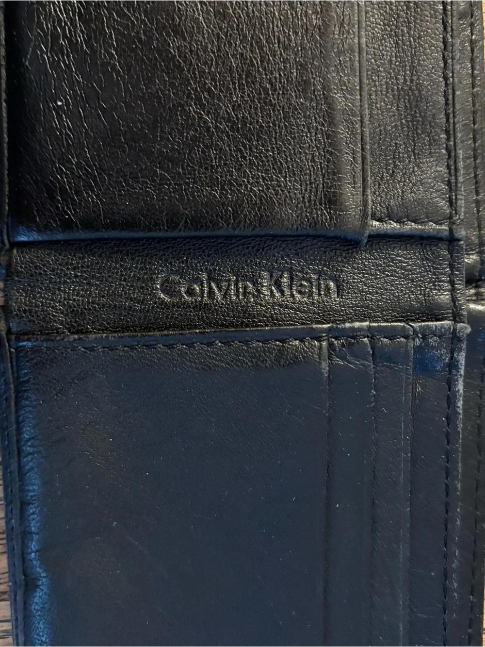 Four Vintage Black and Brown Leather Men's Wallets